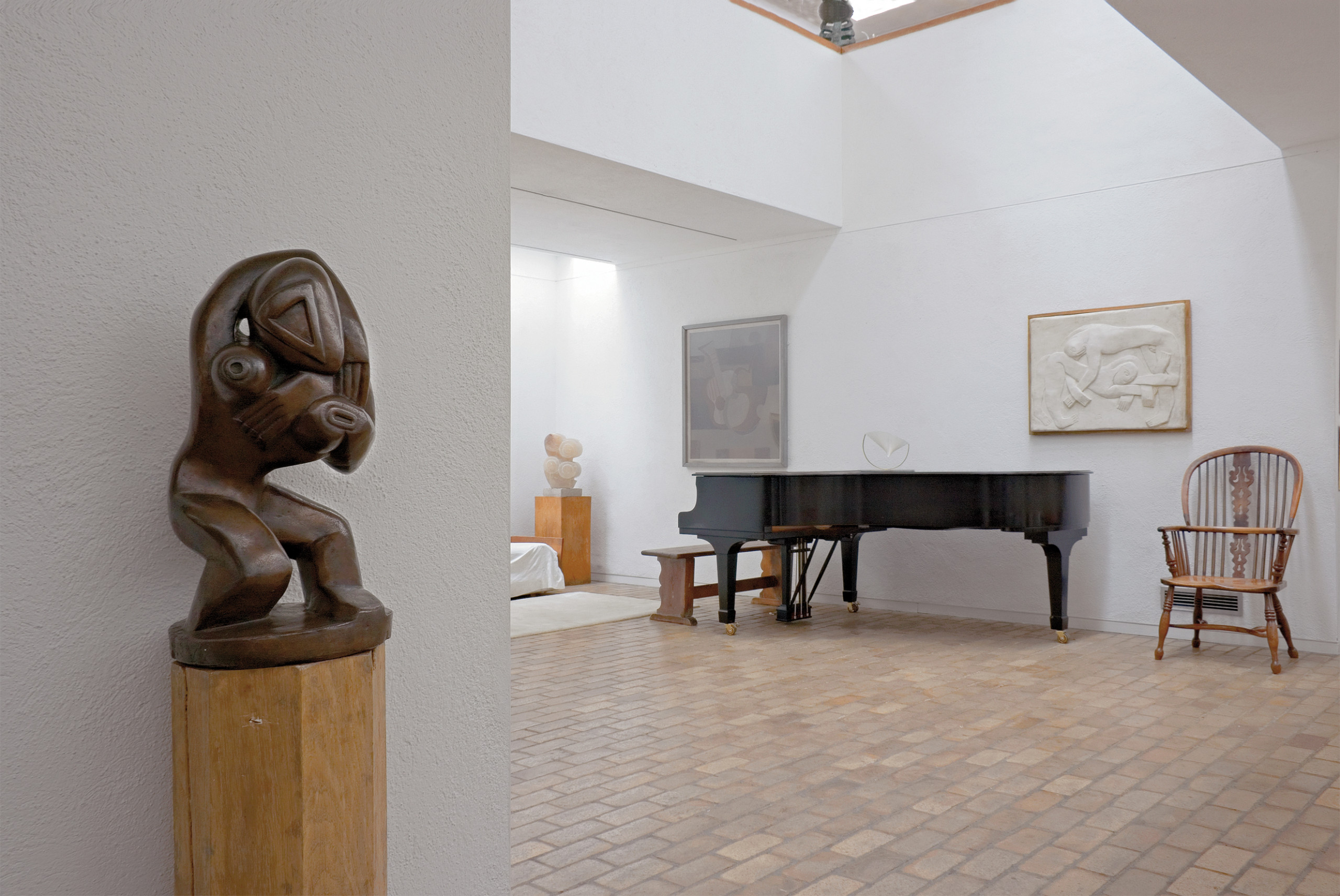 A sculpture and piano at the Kettle's Yard Gallery